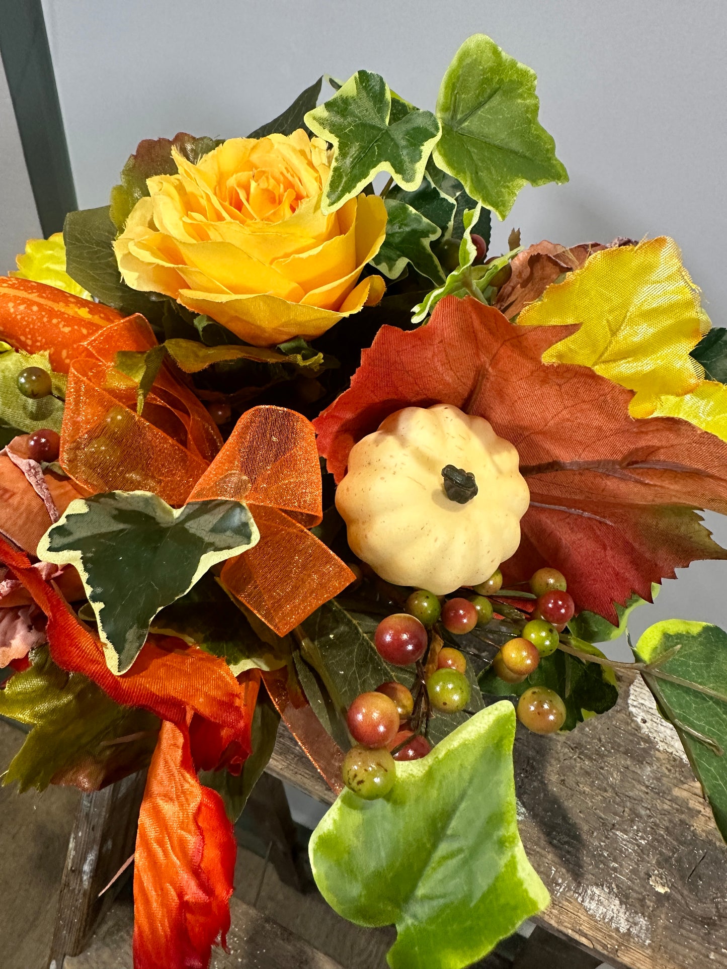 Autumnal dried everlasting arrangement in terracotta pot