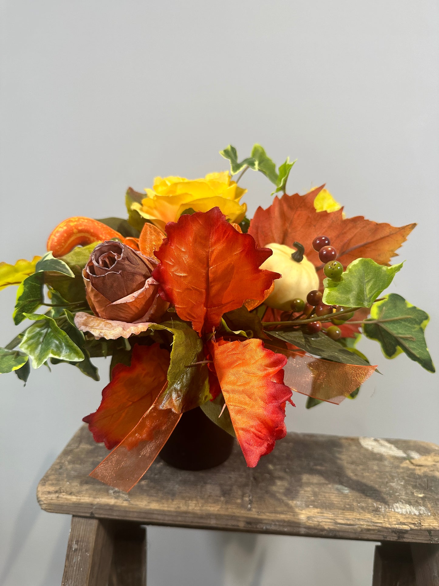 Autumnal dried everlasting arrangement in terracotta pot