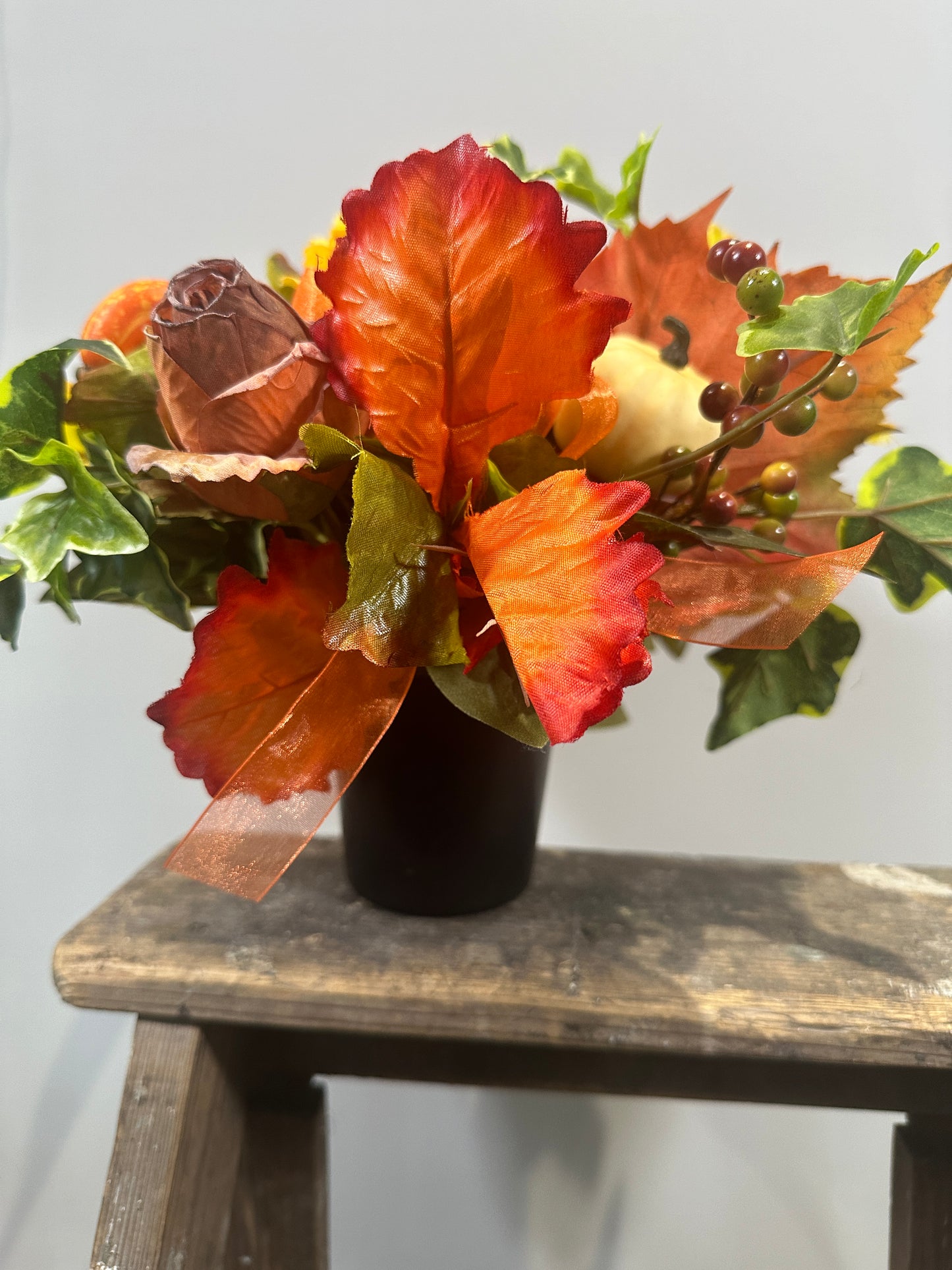 Autumnal dried everlasting arrangement in terracotta pot